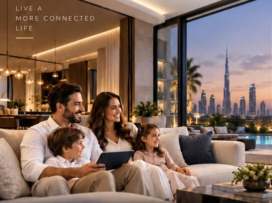 Family in a living room with a lighting, climate and curtain control panel overlay